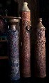 Three tall bottles